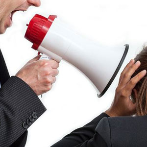 A person using a megaphone near another person’s ear- Moss Bollinger LLP